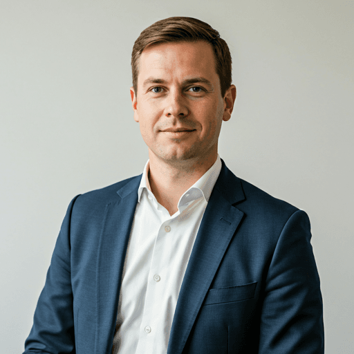 Professional portrait of Rupert McGinty in office